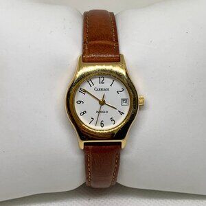 Carriage by Timex indiglo date women watch 25mm gold quartz up to 7”  running
